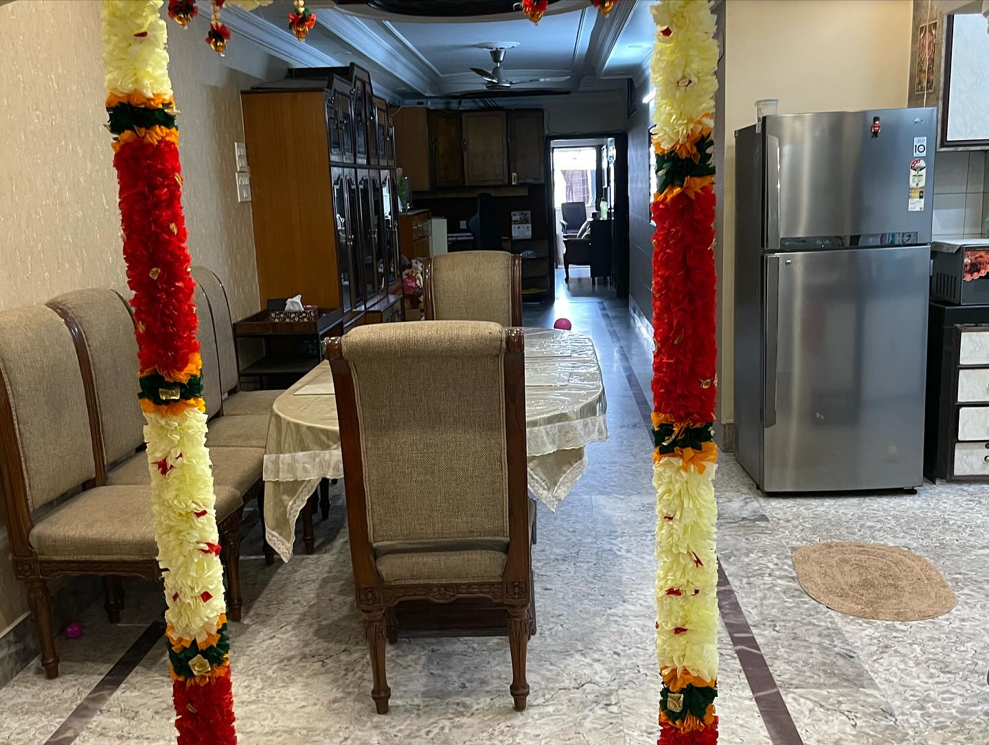 Festive Flower Garland and Bandanwar Collection, a festival décor piece, shown in a 8-image Instagram carousel. Image 2 of 8.