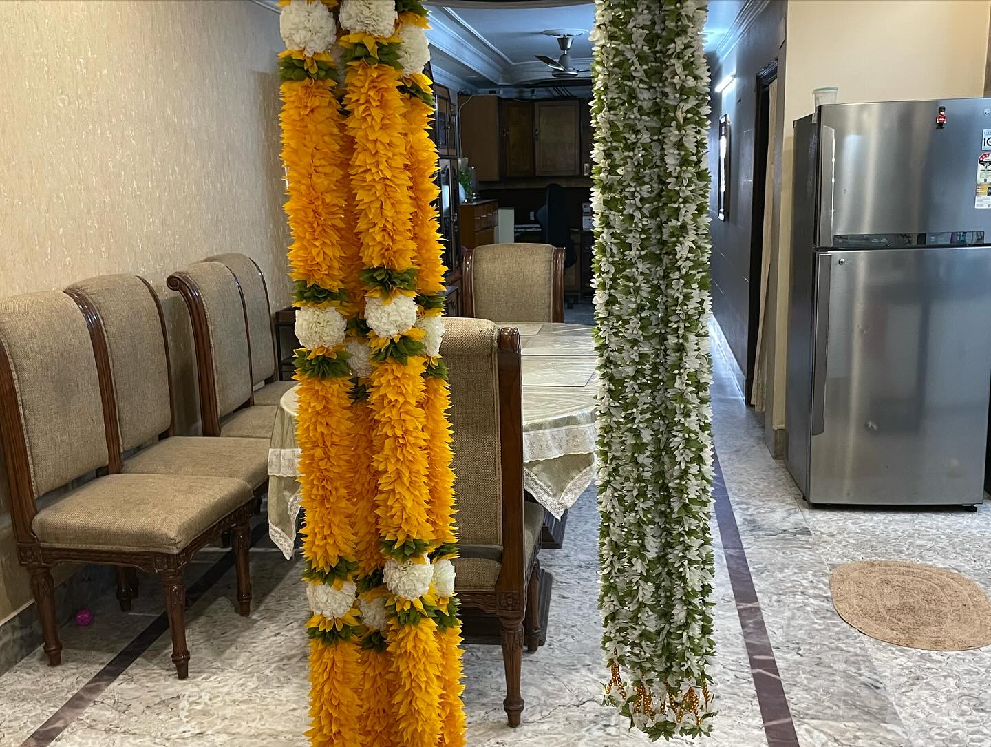 Festive Flower Garland and Bandanwar Collection, a festival décor piece, shown in a 8-image Instagram carousel. Image 3 of 8.