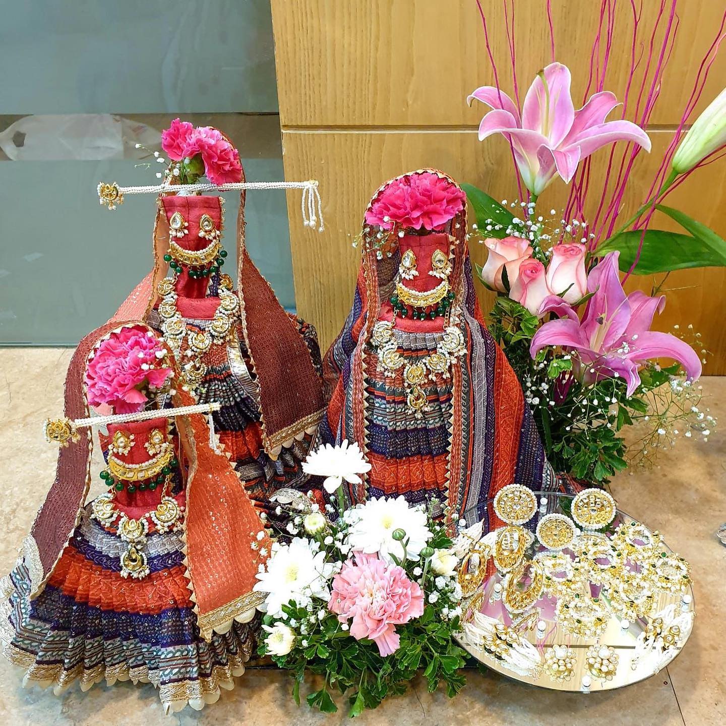 Deity Poshak and Shringar Ensemble, a poshak & shringar piece, shown in a 3-image Instagram carousel. Image 2 of 3.