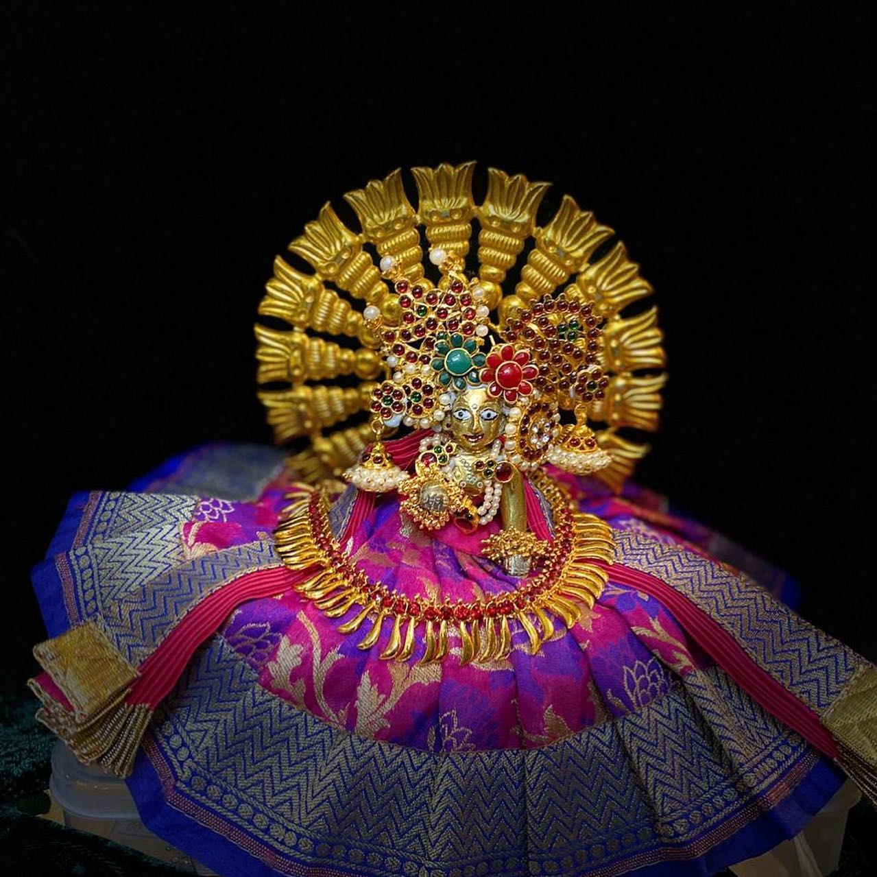 Deity Poshak and Shringar Gallery, a poshak & shringar piece associated in the caption with Radha Krishna, Krishna, shown in a 11-image Instagram carousel. Image 9 of 11.