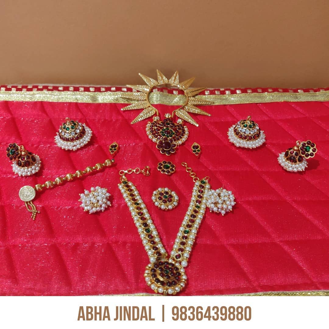Premium Kanha Poshak and Jewellery, a poshak & shringar piece associated in the caption with Krishna, shown in a 3-image Instagram carousel. Image 2 of 3.