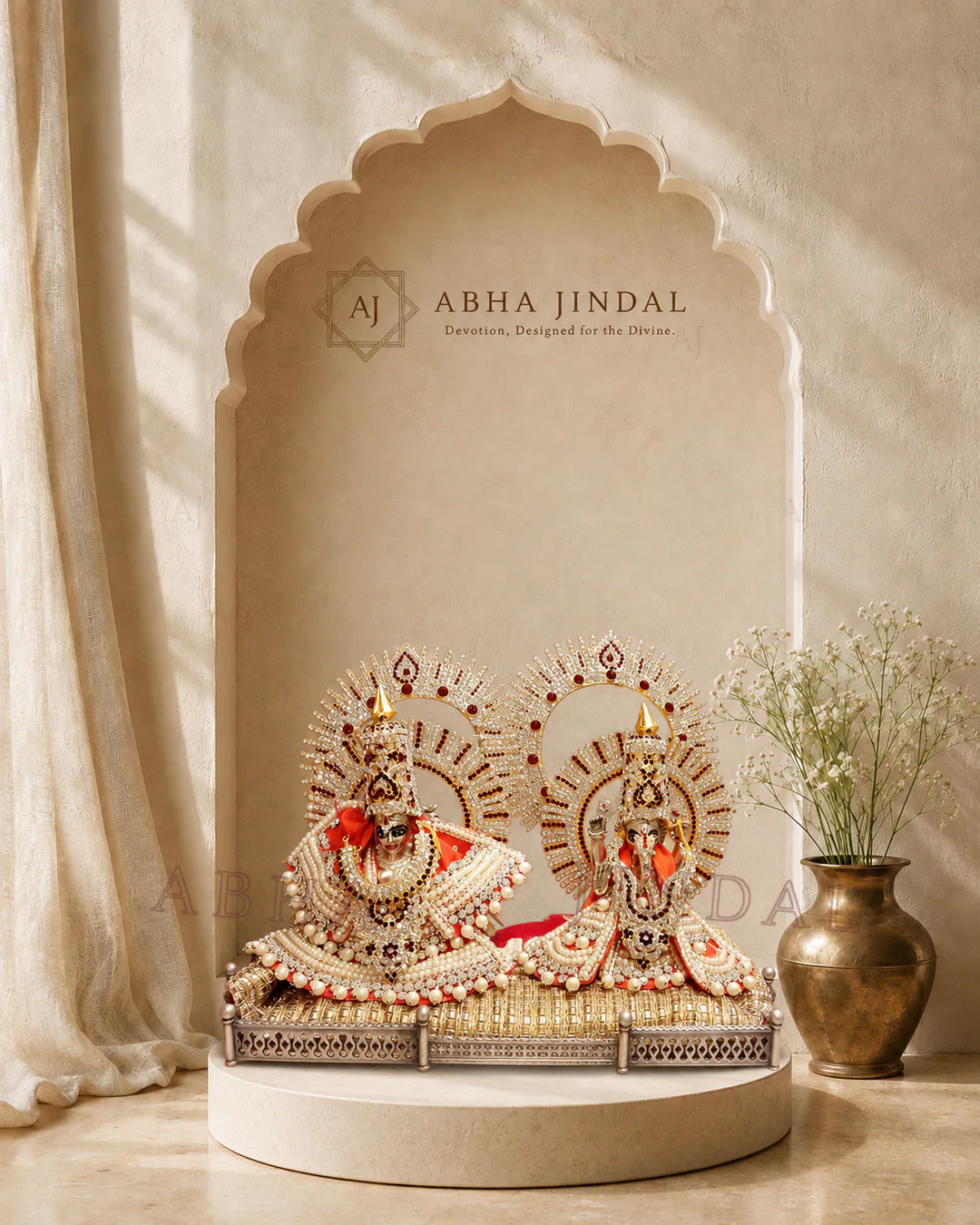 Front view of Ganesh Ji and Lakshmi Ji in pearl-white fan-shaped attire with red accents