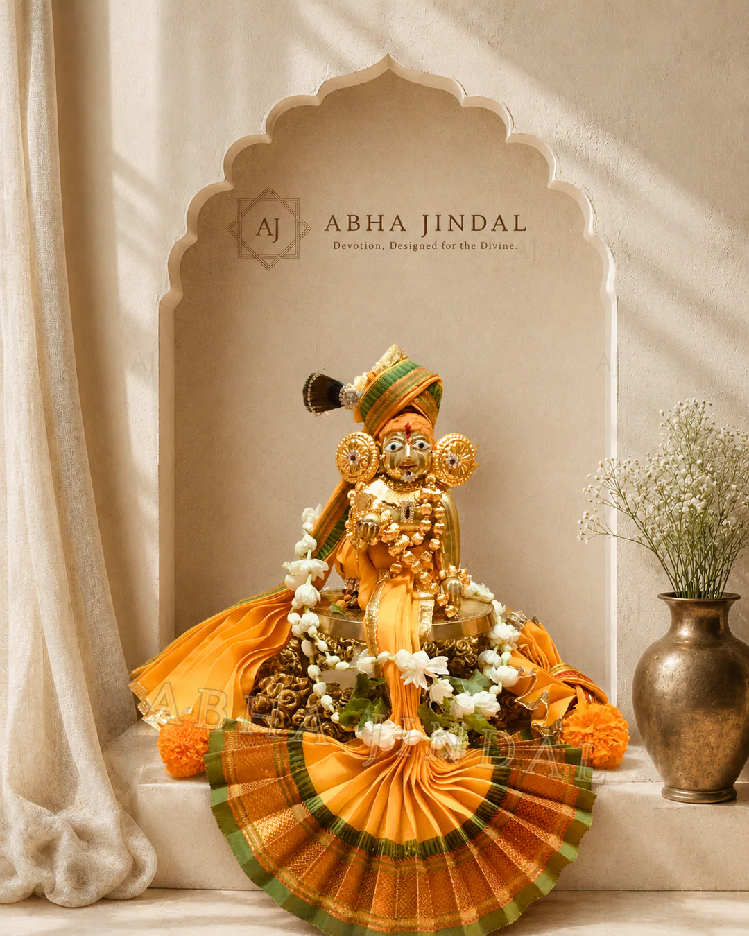 Front view of Shyam Baba with golden-yellow pleats, green borders and white floral garlands