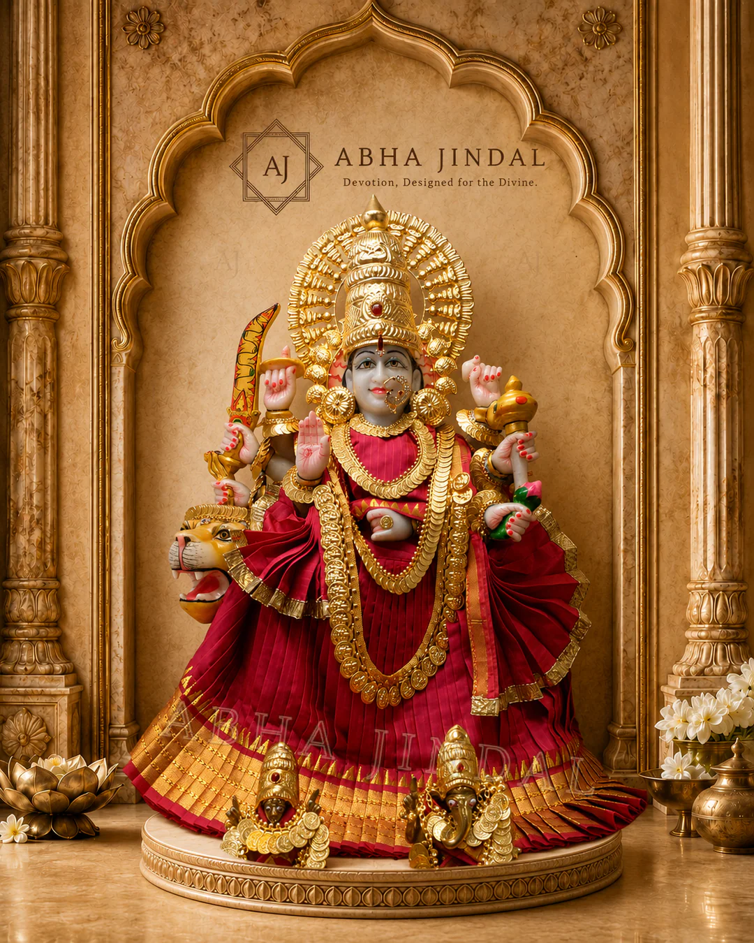 Front view of Mata Rani in crimson-red attire with a broad gold-tone halo and layered adornment