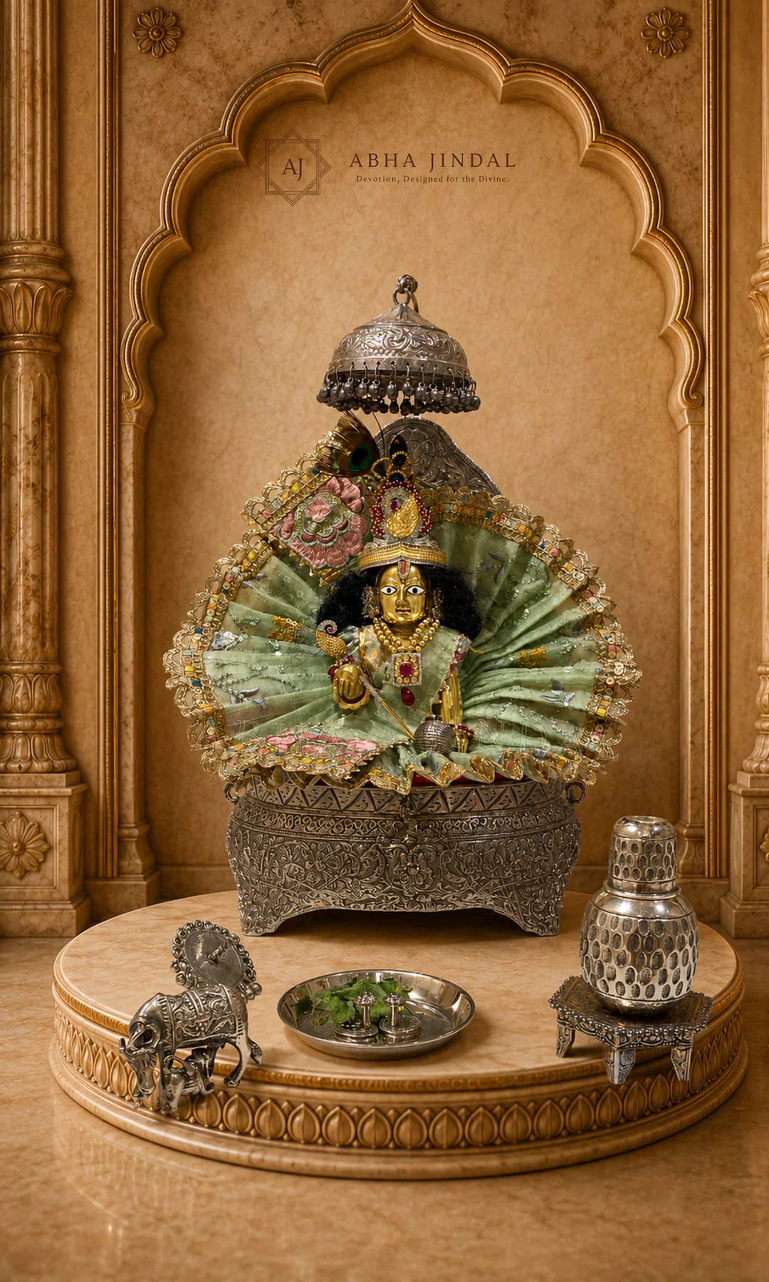 Sage-green Laddu Gopal shringar beneath a silver-tone chhatra with pink floral accents
